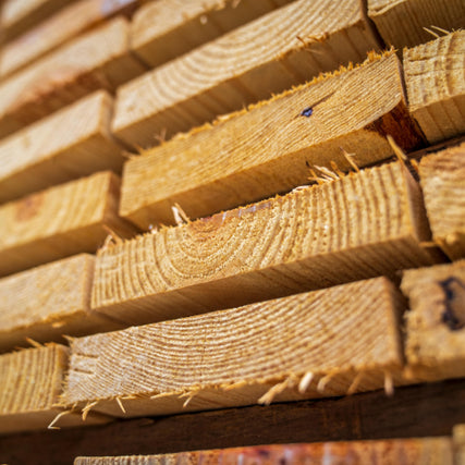 Lumber & Building MaterialsStacked lumber.